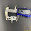 Vertical carrier removeable hook metal spacer