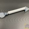 Cord tensioner for curtains